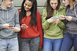 young people with phones