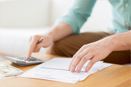 person with calculator