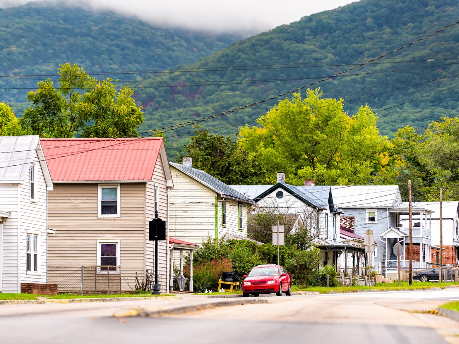 Buena Vista, Virginia small countryside rural town in Blue Ridge mountains, USA in fall autumn with empty residential street road by houses homes.