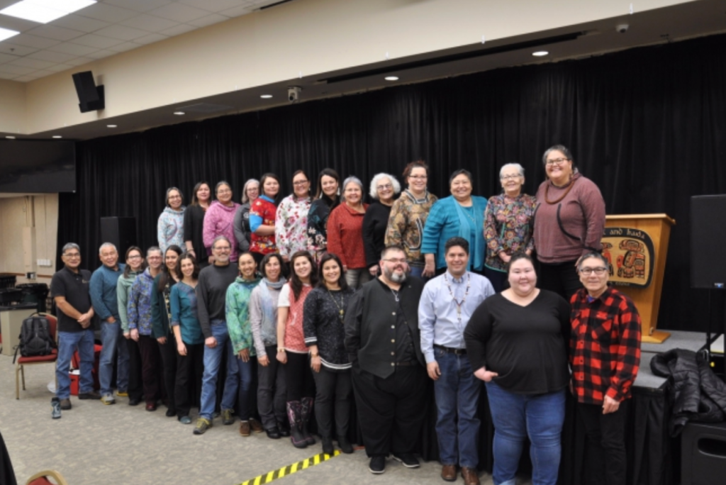 Group photo of 28 Collaborative Hub attendees