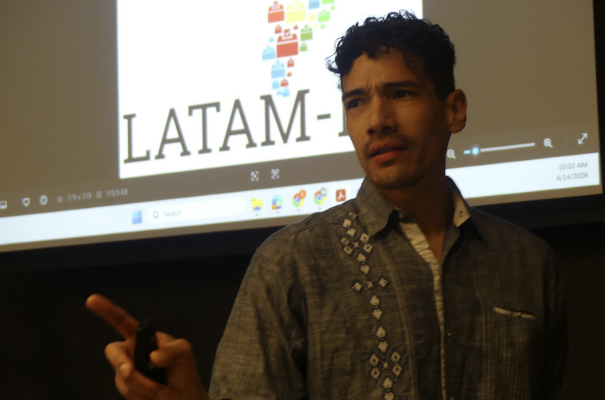 Edgar Franco Vivanco in front of a slide featuring the LATAM-EH logo